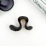 SHAPED CLAW CLIP